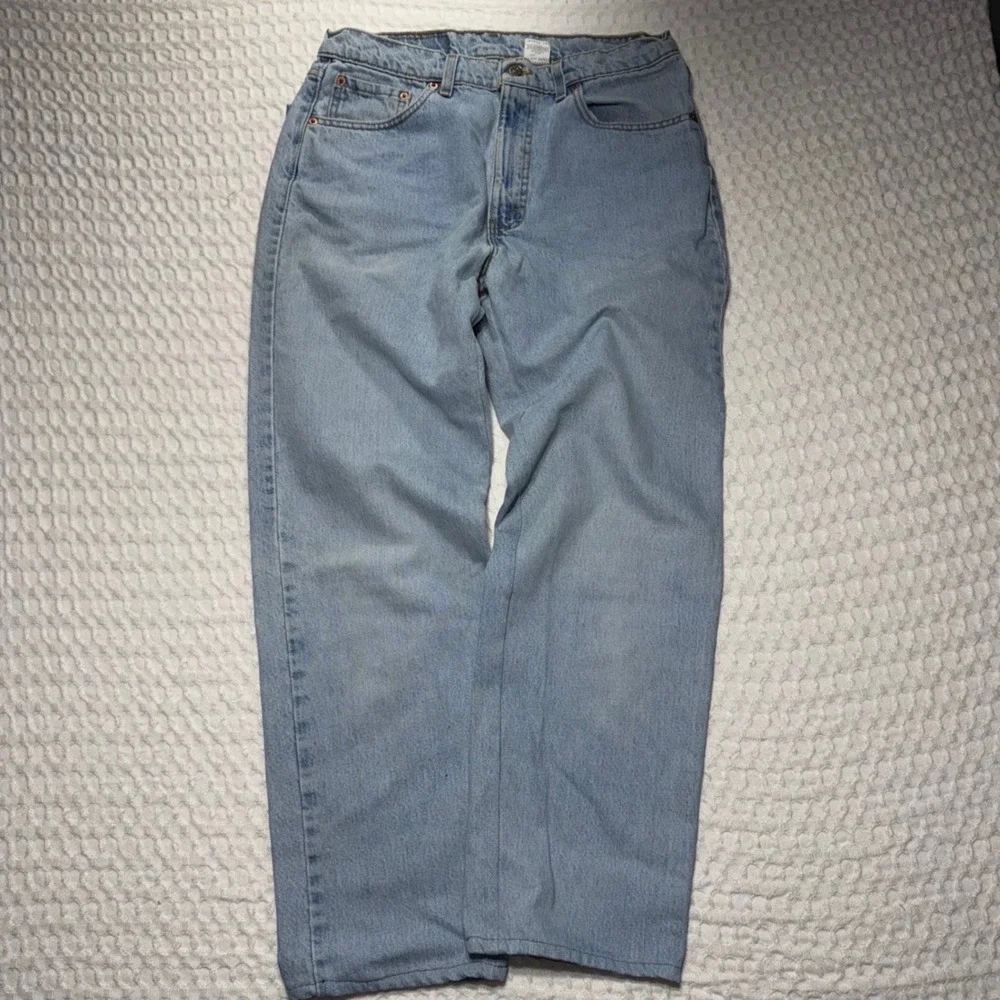 VTG 90s Levis 550 Relaxed Fit Distressed Jeans Mens 34x36 Light Wash Made in USA